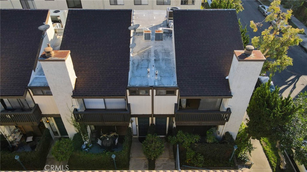 4222 Troost Avenue, Unit 21 Studio City, CA 91604 - Photo 42 of 47 an aerial view of a house with garden space and street view