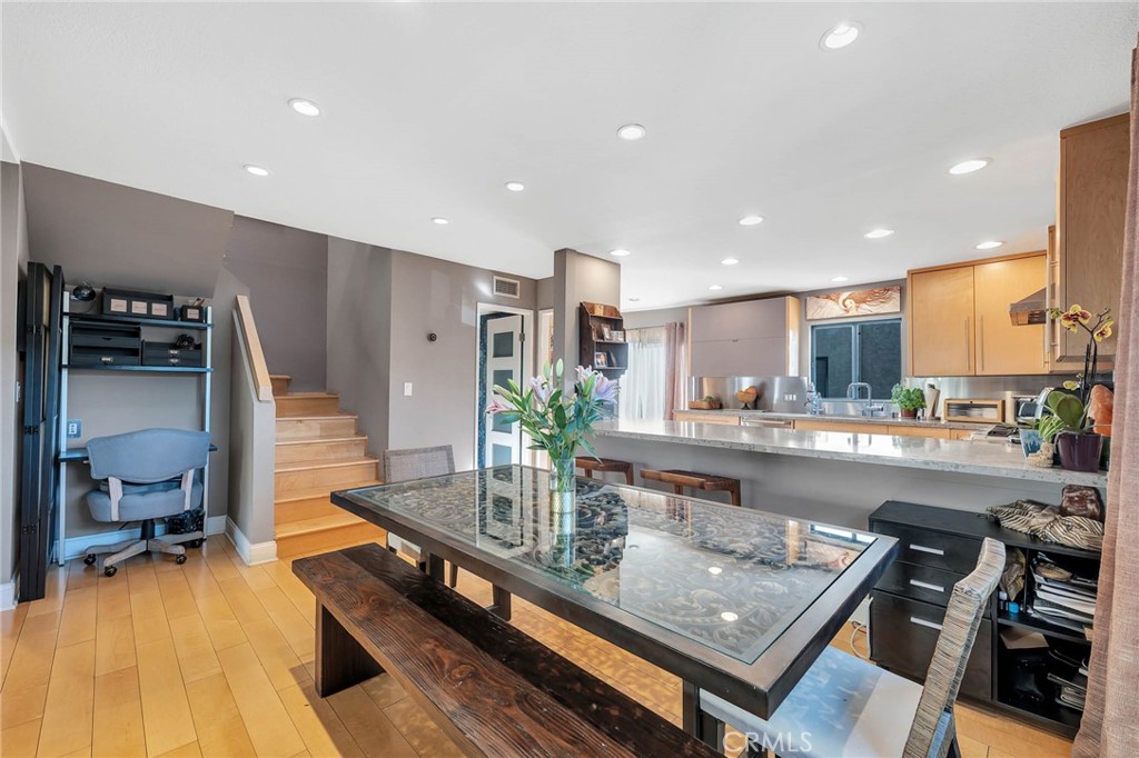 4222 Troost Avenue, Unit 21 Studio City, CA 91604 - Photo 5 of 47 a kitchen with stainless steel appliances granite countertop counter space a sink and a stove