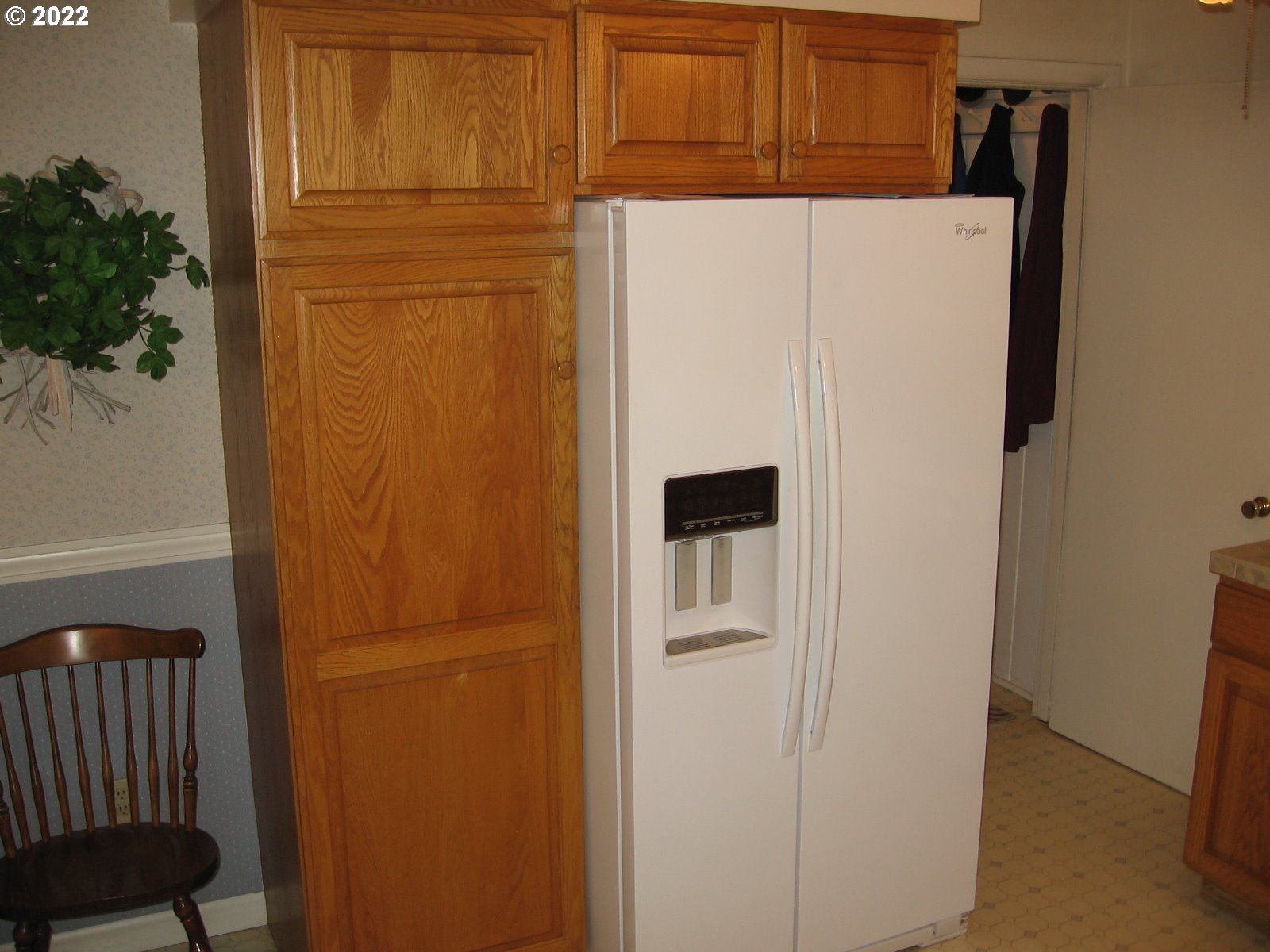 1023 Northeast 172nd Avenue Portland, OR 97230 - Photo 11 of 23 a white refrigerator freezer and a microwave