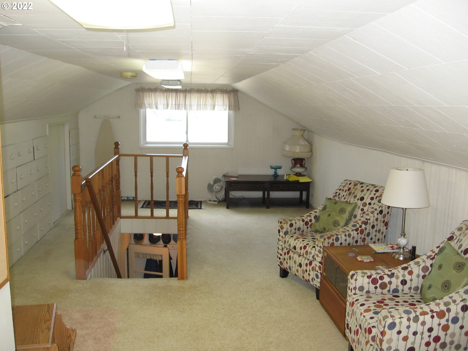 1023 Northeast 172nd Avenue Portland, OR 97230 - Photo 16 of 23 a living room with furniture and a window