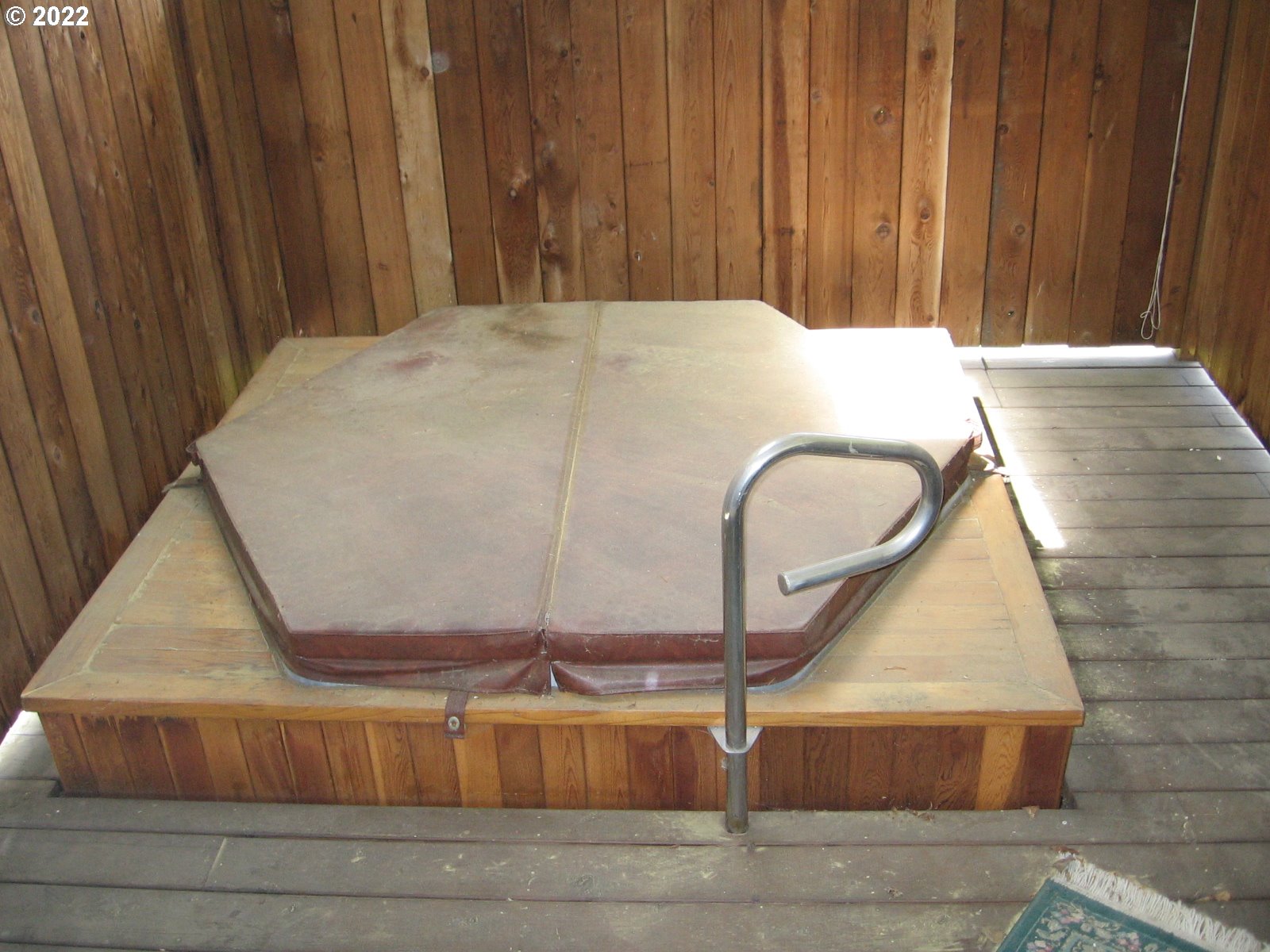1023 Northeast 172nd Avenue Portland, OR 97230 - Photo 18 of 23 a room with a table and mirror