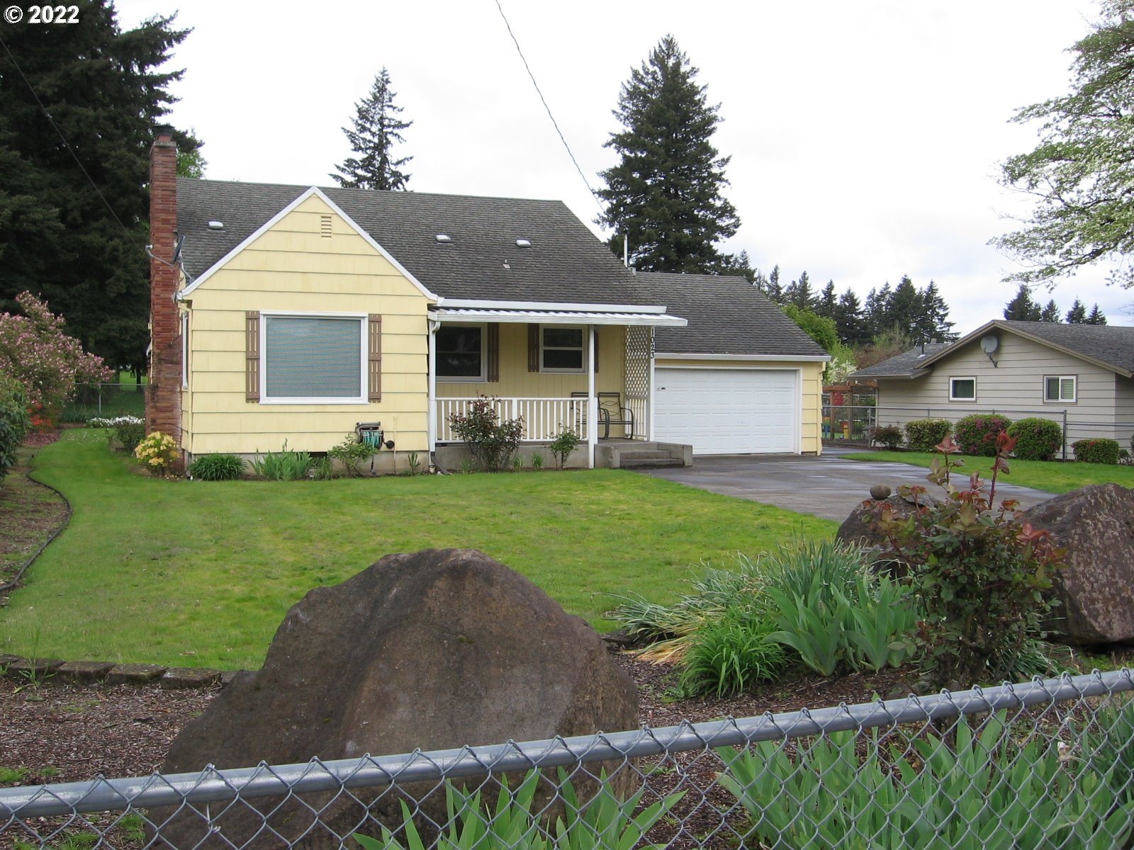 1023 Northeast 172nd Avenue Portland, OR 97230 - Photo 2 of 23 a front view of house with yard and green space