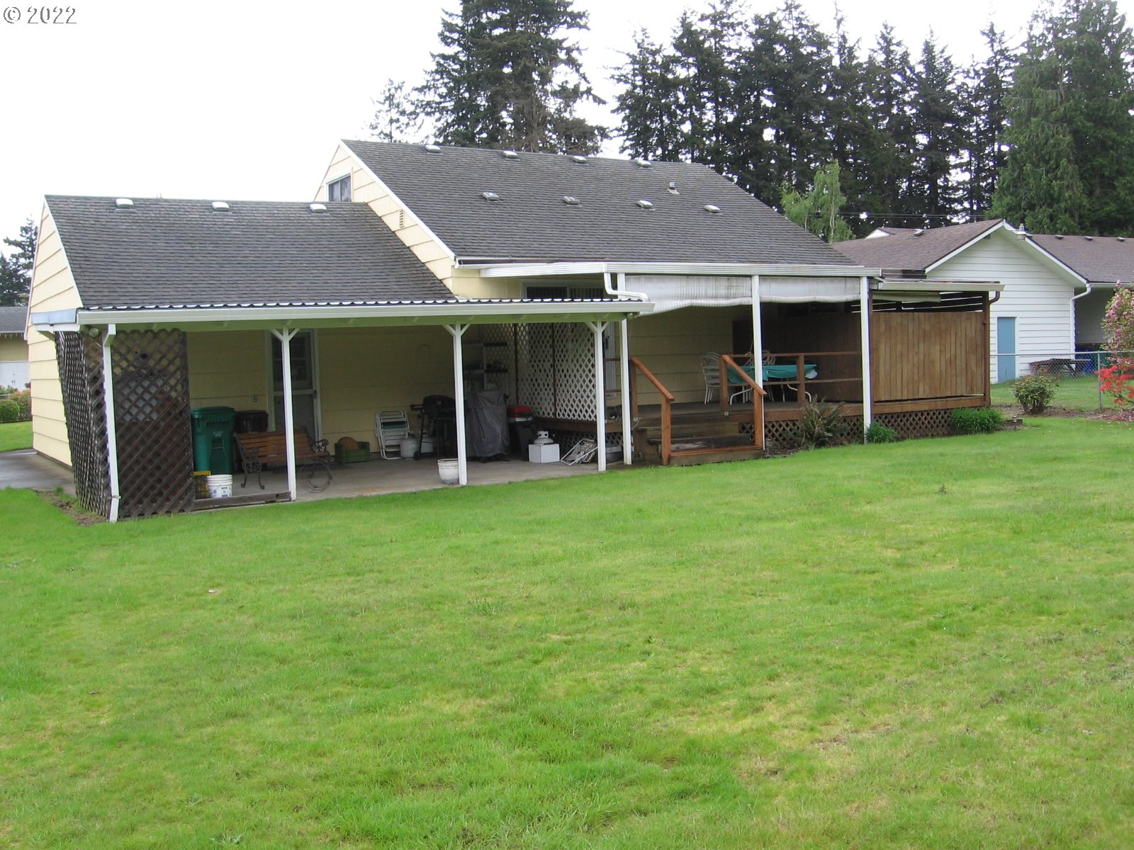 1023 Northeast 172nd Avenue Portland, OR 97230 - Photo 21 of 23 a view of a house with a yard and sitting area
