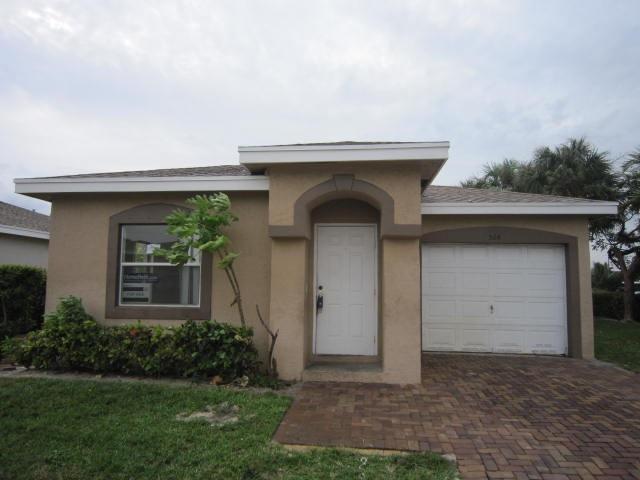 524 East Ridge Circle North Boynton Beach, FL 33435 - Photo 1 of 15 Front