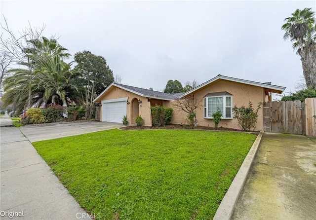 an aerial view of a house with a garden