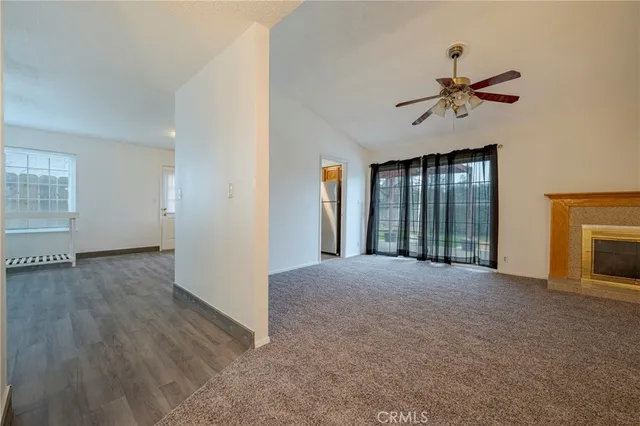 a kitchen with sink a microwave and refrigerator