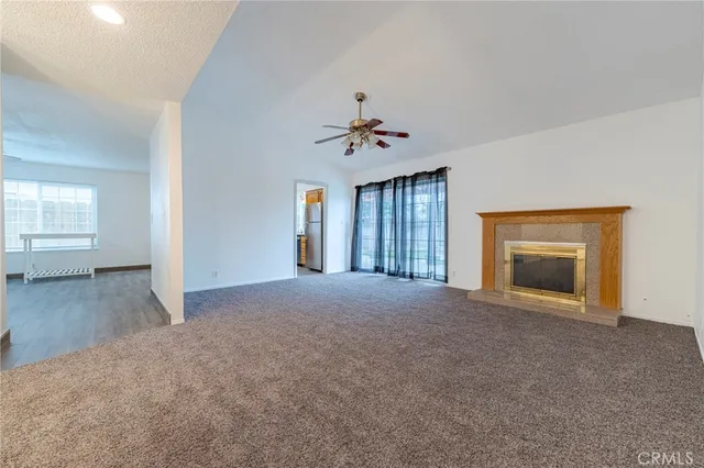 a kitchen with stainless steel appliances granite countertop cabinets and a refrigerator