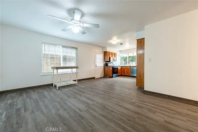 a bathroom with a toilet a sink and a mirror
