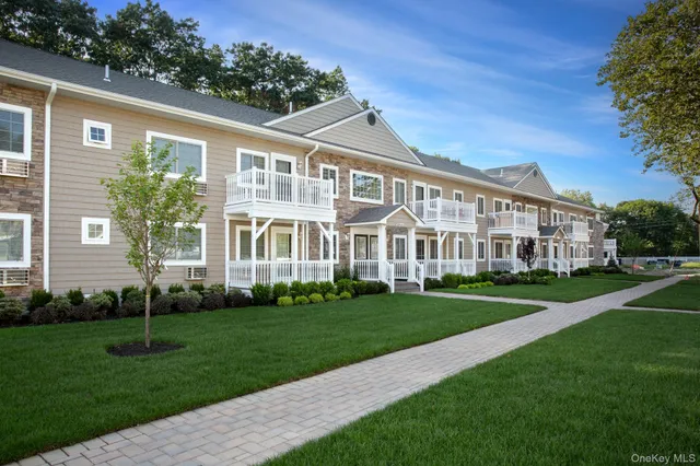 a view of a yard in front of a house
