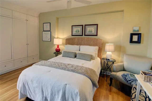 a bedroom with bed and a window