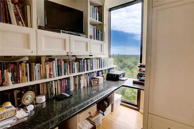 a room with furniture and a flat screen tv