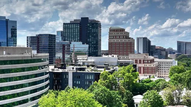 a view of a city with tall buildings