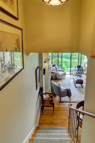 a view of a swimming pool with seating area