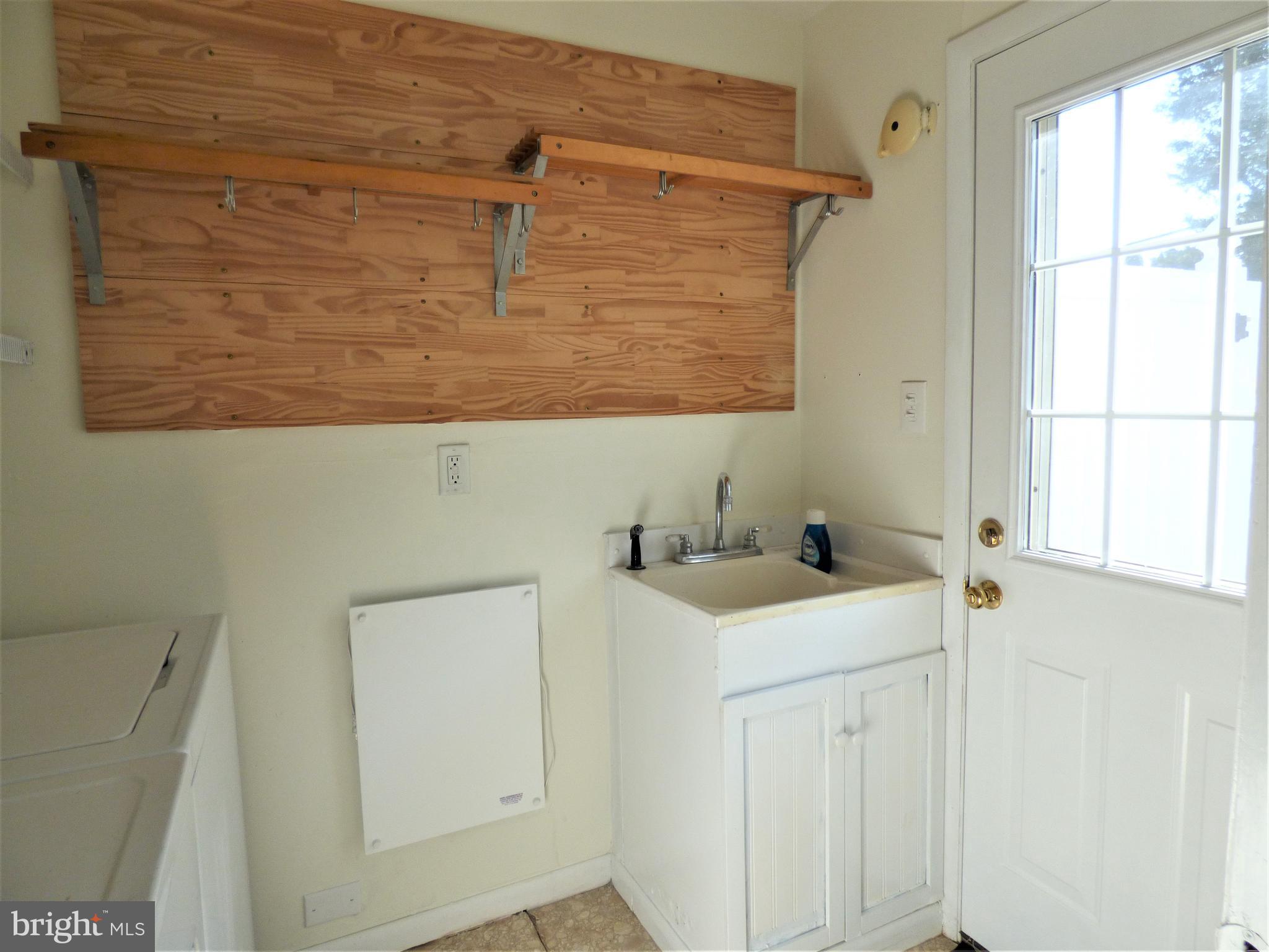 251 Parry Road Warminster, PA 18974 - Photo 27 of 34 Laundry Room - Door to Rear Yard
