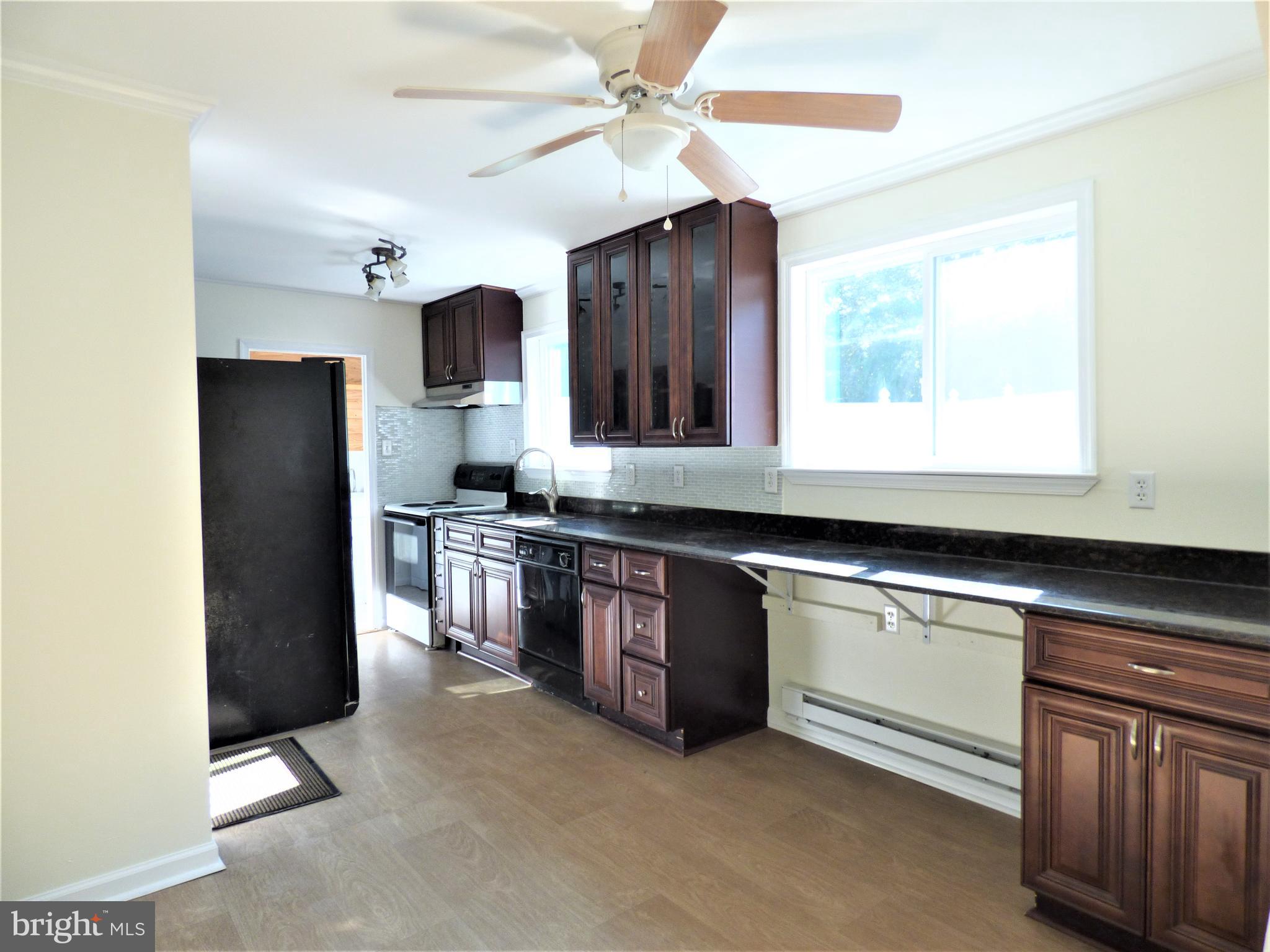 251 Parry Road Warminster, PA 18974 - Photo 8 of 34 Granite Counters, Glass Tile Backsplash