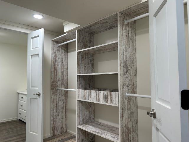 8353 Mannik Road Iron River, WI 54847 - Photo 15 of 48 Spacious closet with wood finished floors