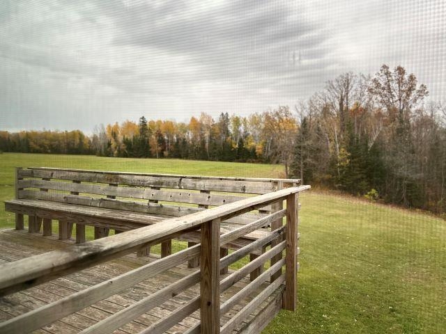 8353 Mannik Road Iron River, WI 54847 - Photo 40 of 48 Wooden terrace featuring a yard and a forest view