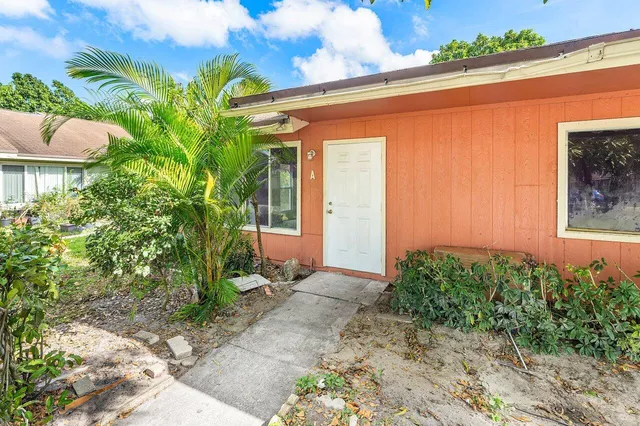 a front view of house with yard