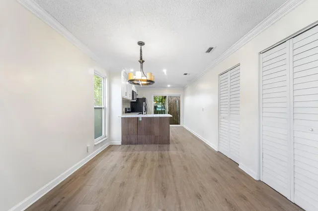a view of a house with wooden floor