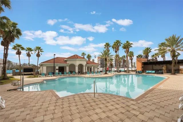 a front view of a house with a chairs and a table