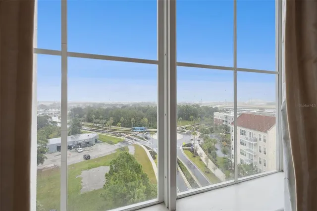 a view of a room and window