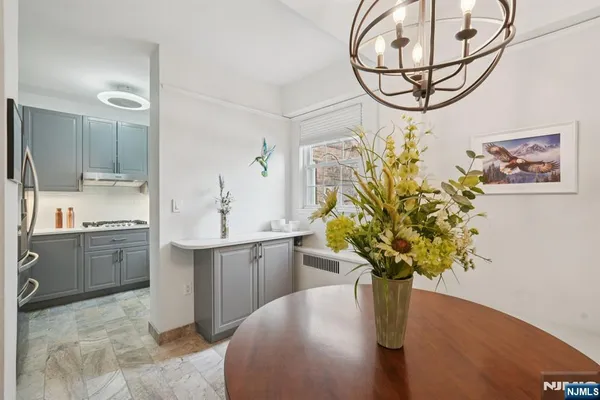 a vase of flowers sitting on a table