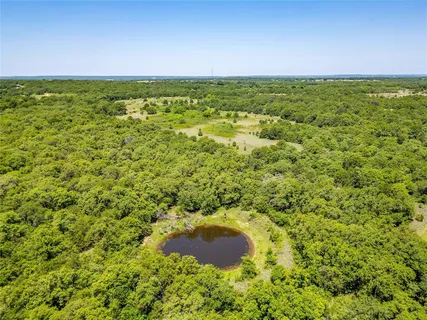 a view of swimming pool from a lake view