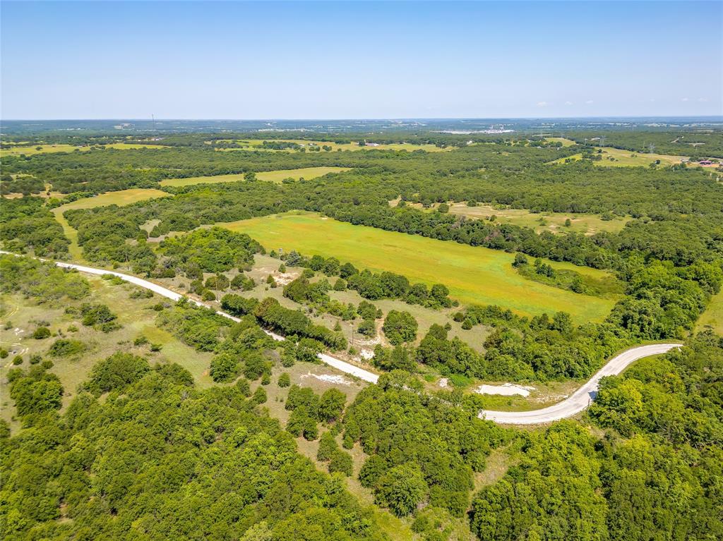 613 County Road 3848 Poolville, TX 76487 - Photo 3 of 40 a view of an ocean