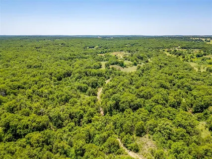 a view of a yard with an outdoor space