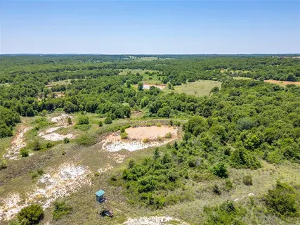 a view of a yard with an outdoor space