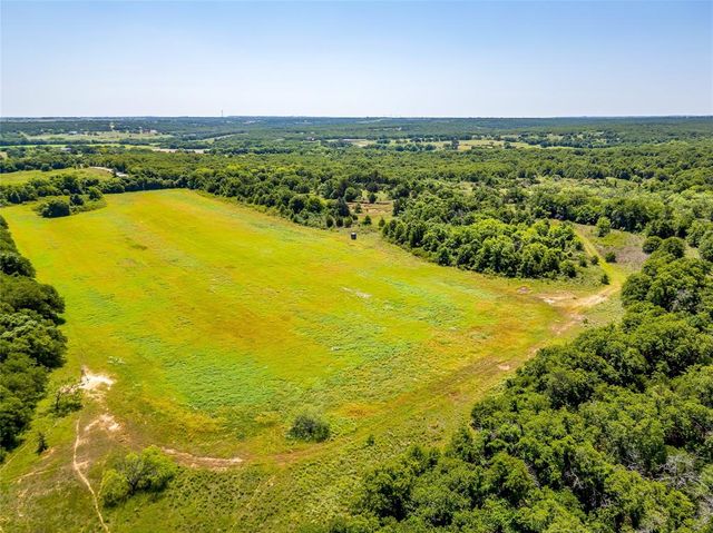 a view of an ocean from a city