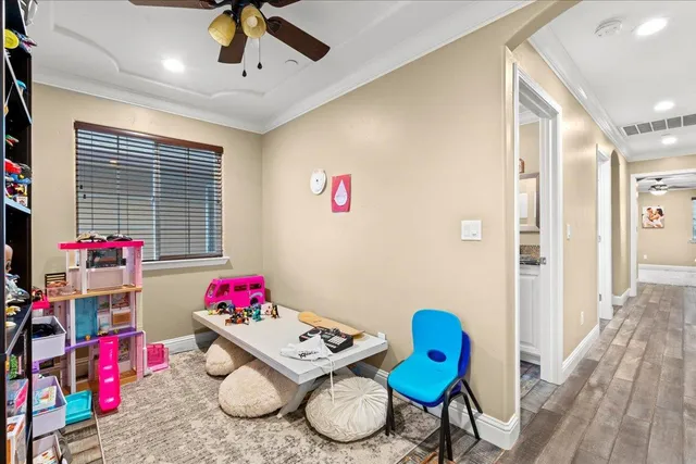 a bathroom with a granite countertop sink a mirror and a shower