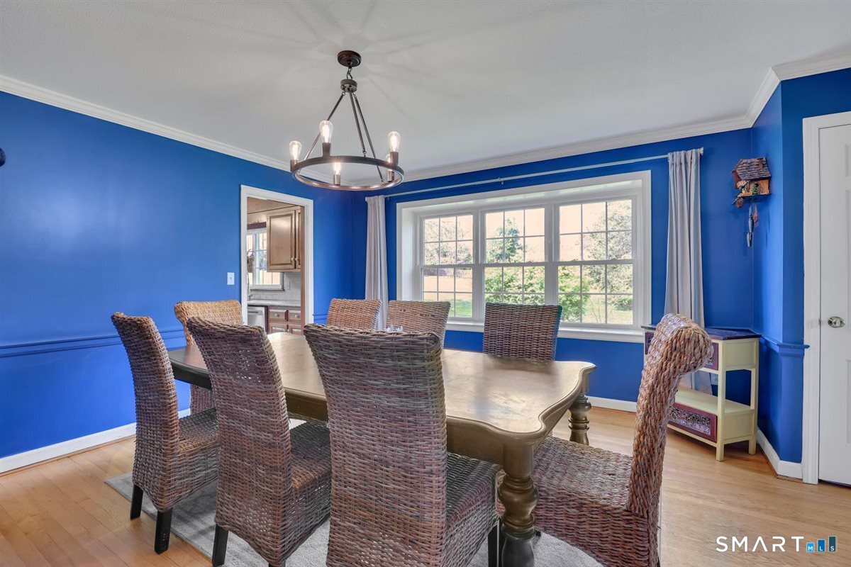 72 Old Post Road Wethersfield, CT 06109 - Photo 12 of 40 a view of a dining room with furniture window and wooden floor