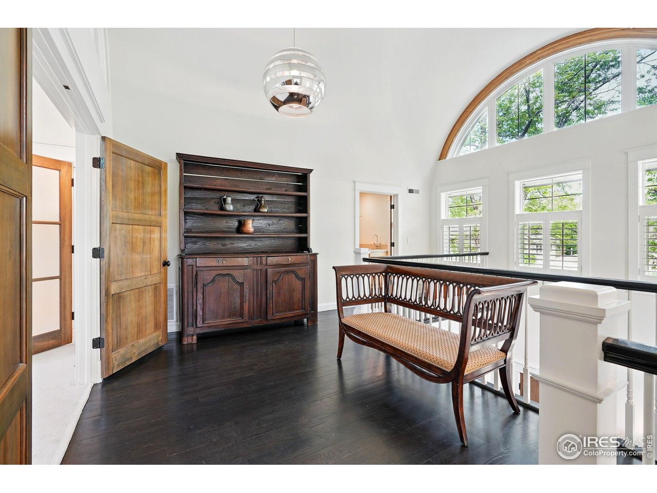 3219 7th Street Boulder, CO 80304 - Photo 19 of 34 a view of a room with furniture and wooden floor