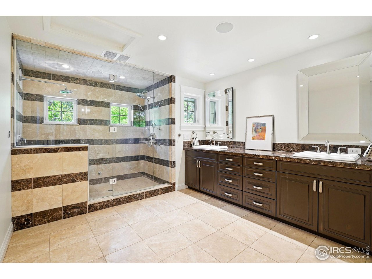 3219 7th Street Boulder, CO 80304 - Photo 25 of 34 a large bathroom with a sink and a mirror