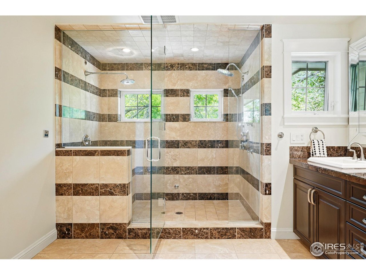 3219 7th Street Boulder, CO 80304 - Photo 26 of 34 a view of a bathroom with a tub and sink