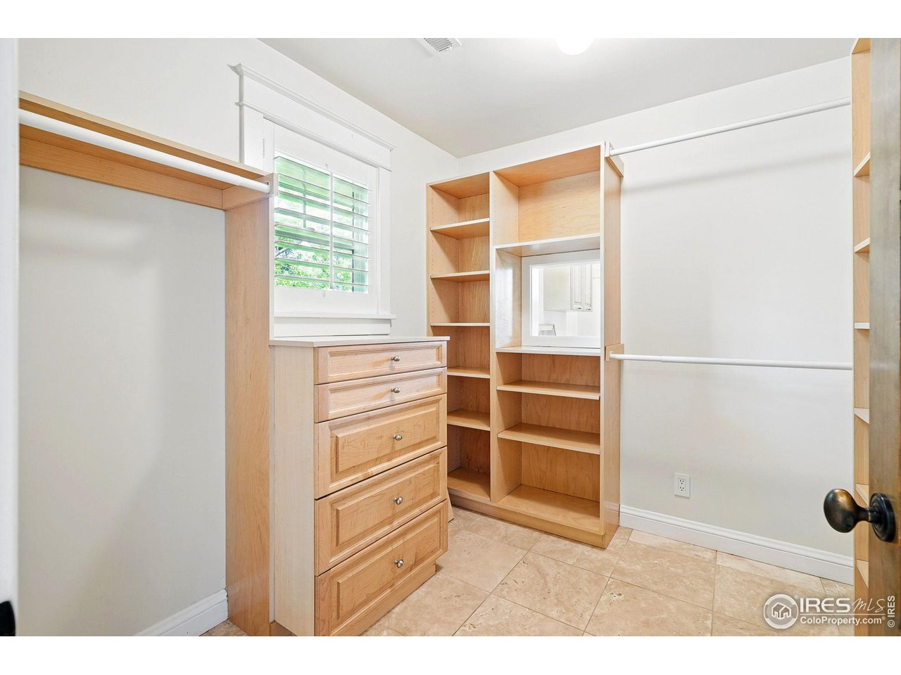 3219 7th Street Boulder, CO 80304 - Photo 27 of 34 a room with closet and windows