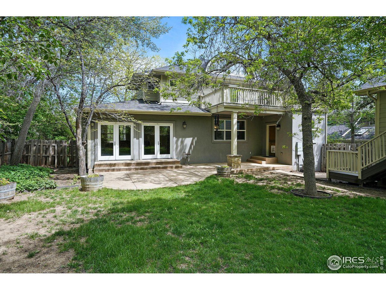 3219 7th Street Boulder, CO 80304 - Photo 31 of 34 a view of a house with a yard and sitting area