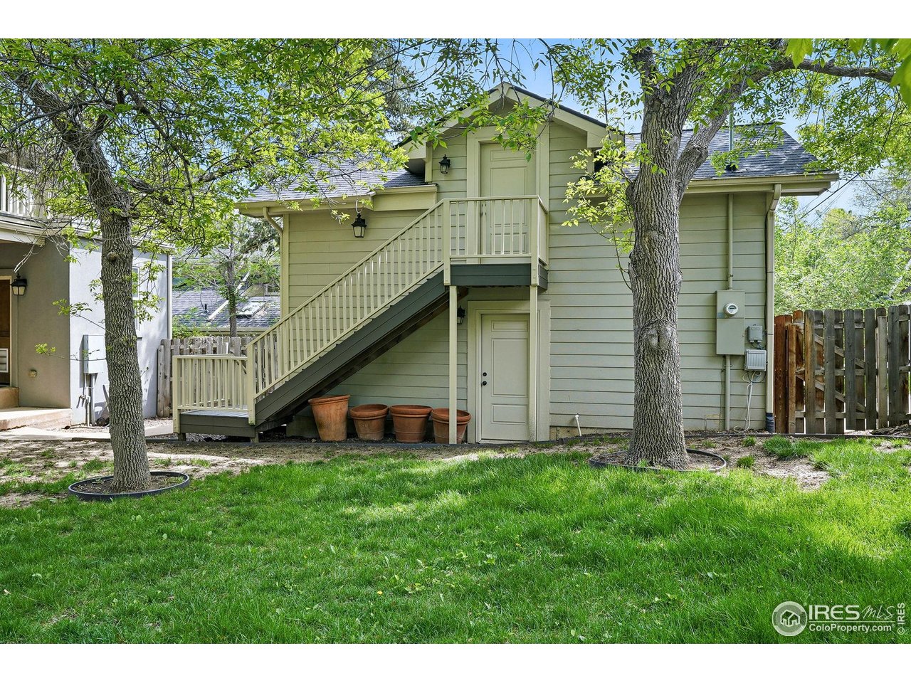 3219 7th Street Boulder, CO 80304 - Photo 32 of 34 a view of front of a house with a yard