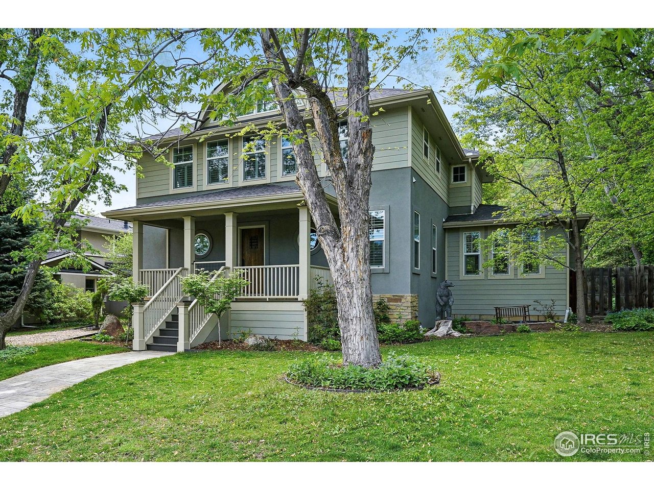 3219 7th Street Boulder, CO 80304 - Photo 34 of 34 a view of a house with a yard and plants
