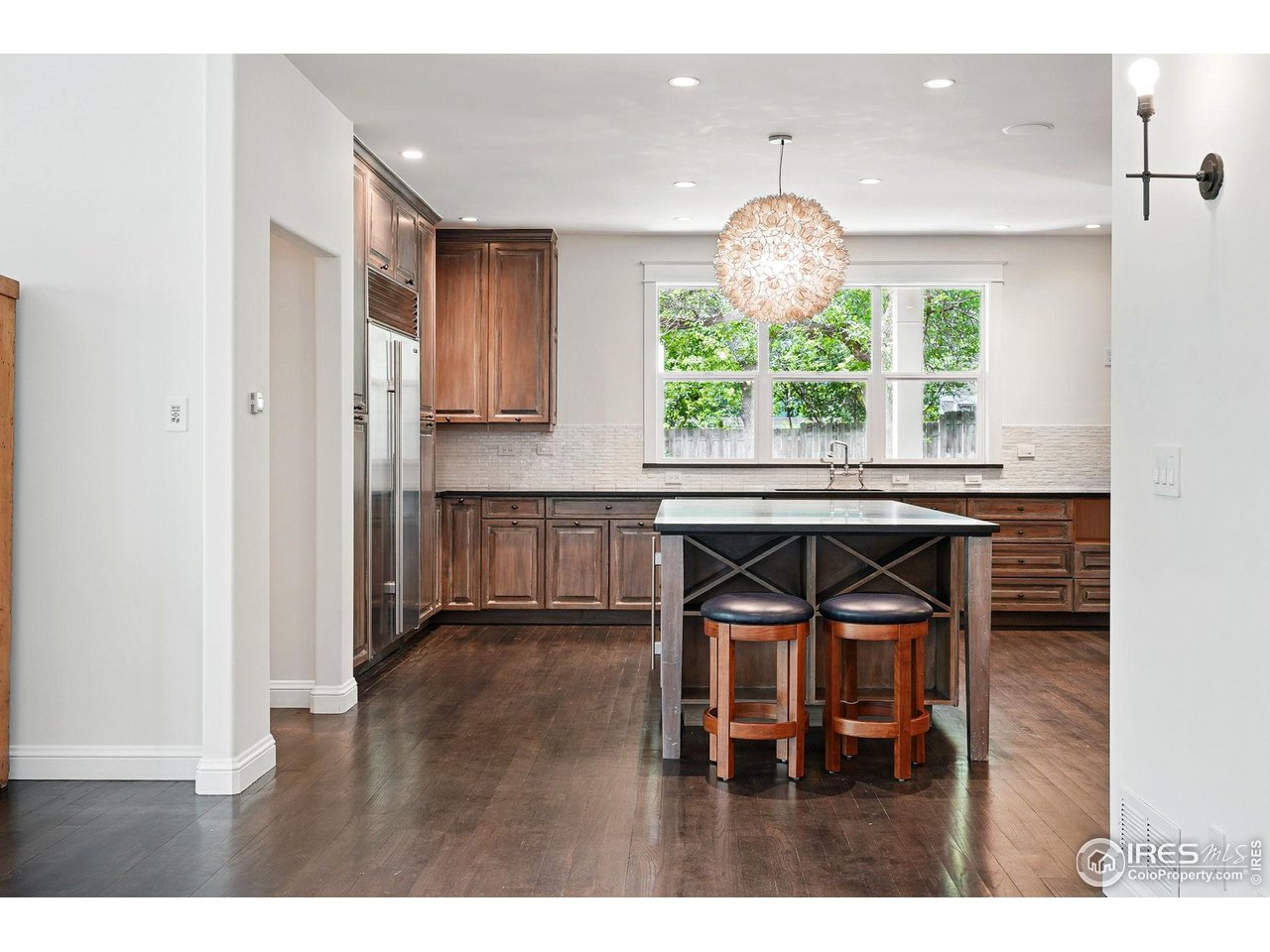 3219 7th Street Boulder, CO 80304 - Photo 9 of 34 a kitchen with a table and chairs