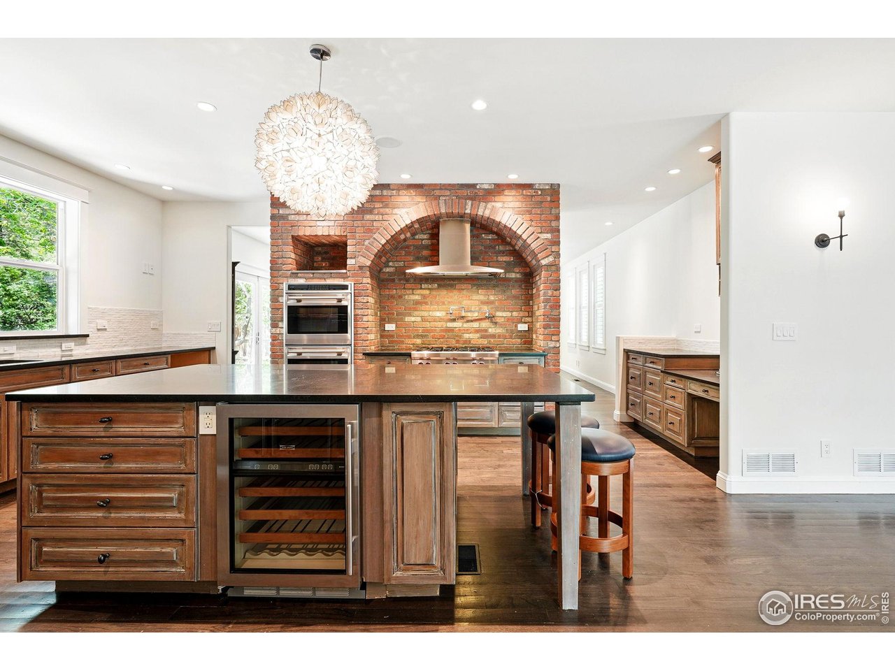3219 7th Street Boulder, CO 80304 - Photo 10 of 34 a view of kitchen with granite countertop cabinets and window