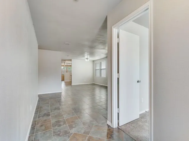 a kitchen with stainless steel appliances granite countertop a stove sink and microwave