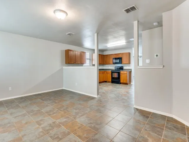 a view of a kitchen with a sink