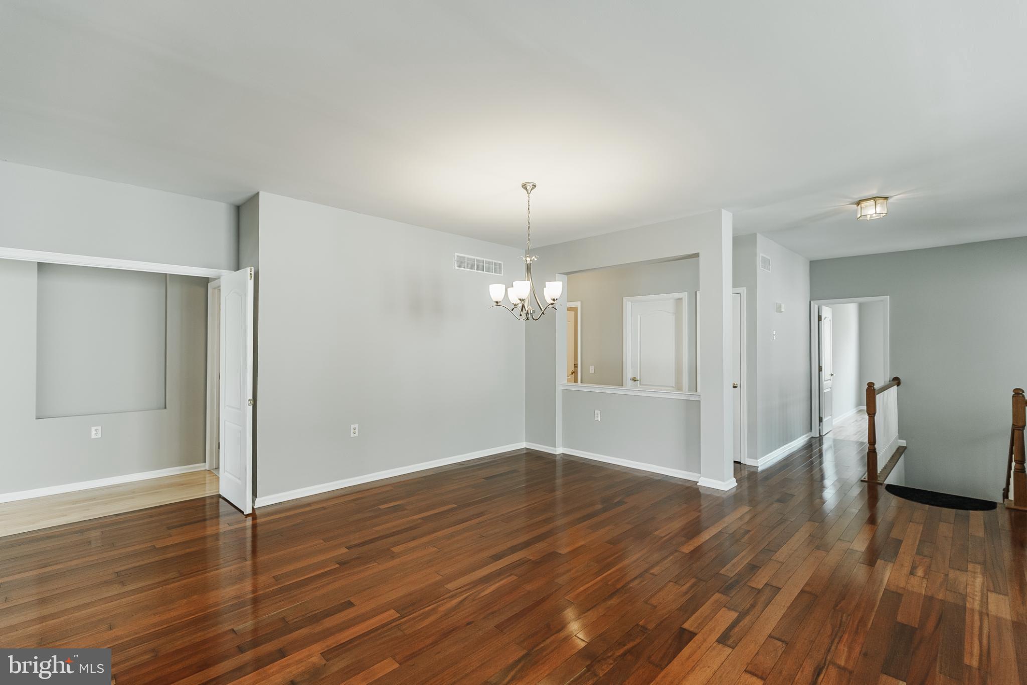 1484 Quaker Ridge West Chester, PA 19380 - Photo 13 of 50 Spacious, sunlit living area with elegance.