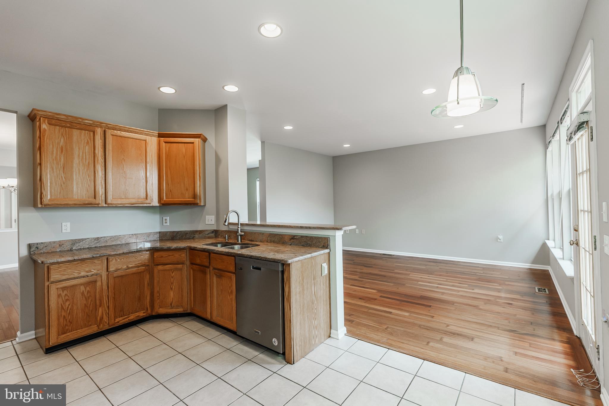 1484 Quaker Ridge West Chester, PA 19380 - Photo 14 of 50 Spacious kitchen with modern elegance.