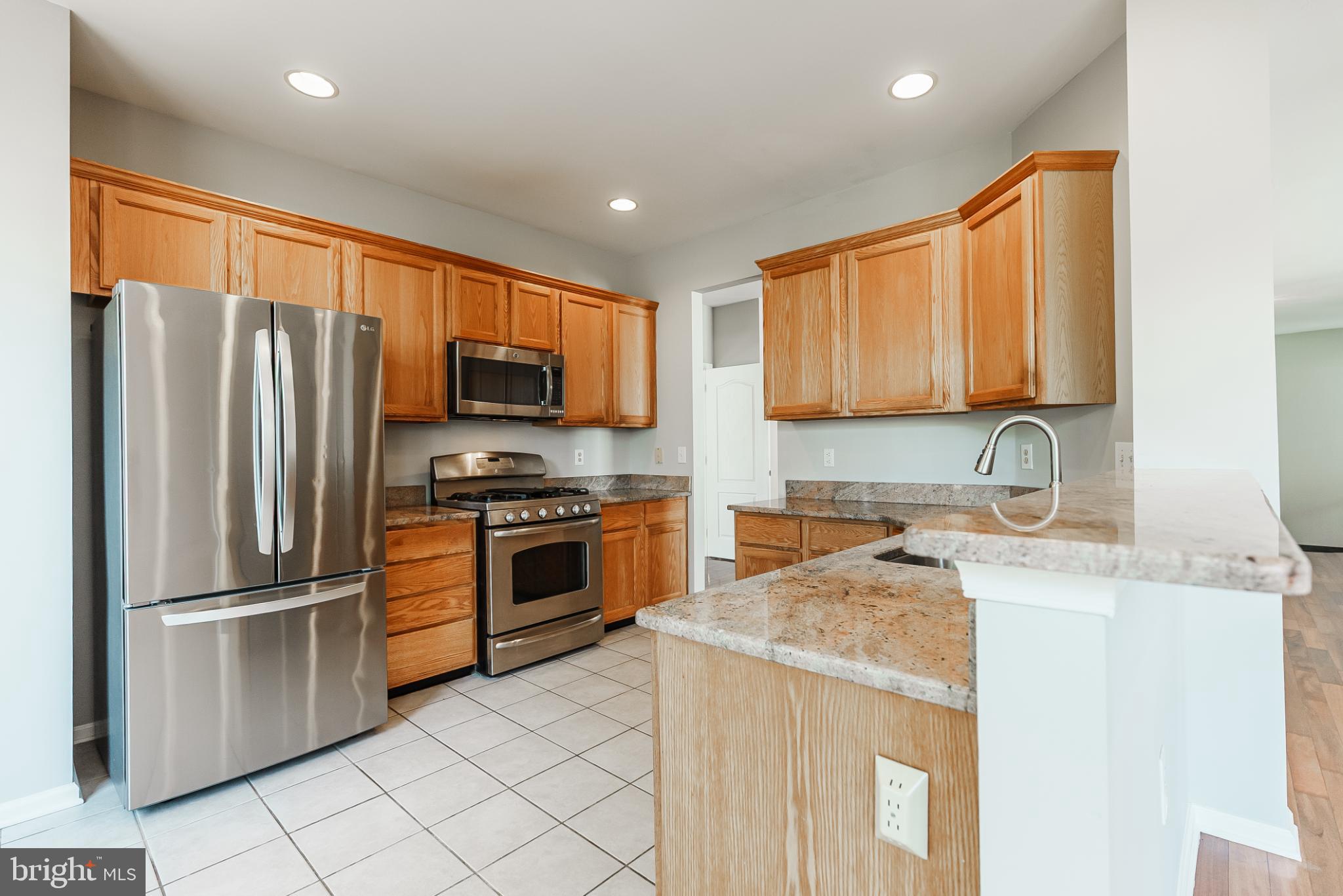 1484 Quaker Ridge West Chester, PA 19380 - Photo 18 of 50 Modern kitchen with sleek finishes.
