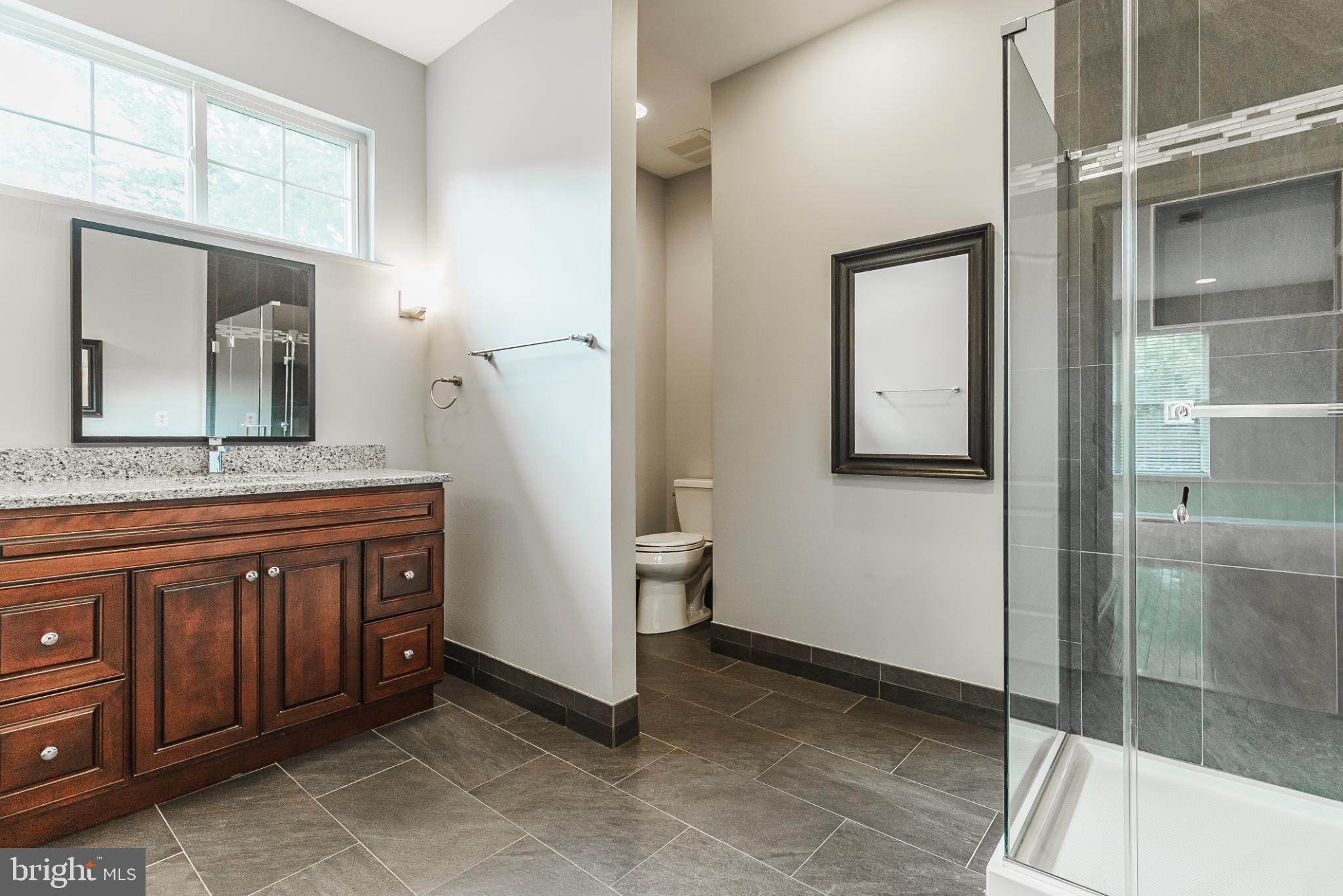 1484 Quaker Ridge West Chester, PA 19380 - Photo 45 of 50 Modern renovated bathroom with two separate sinks
