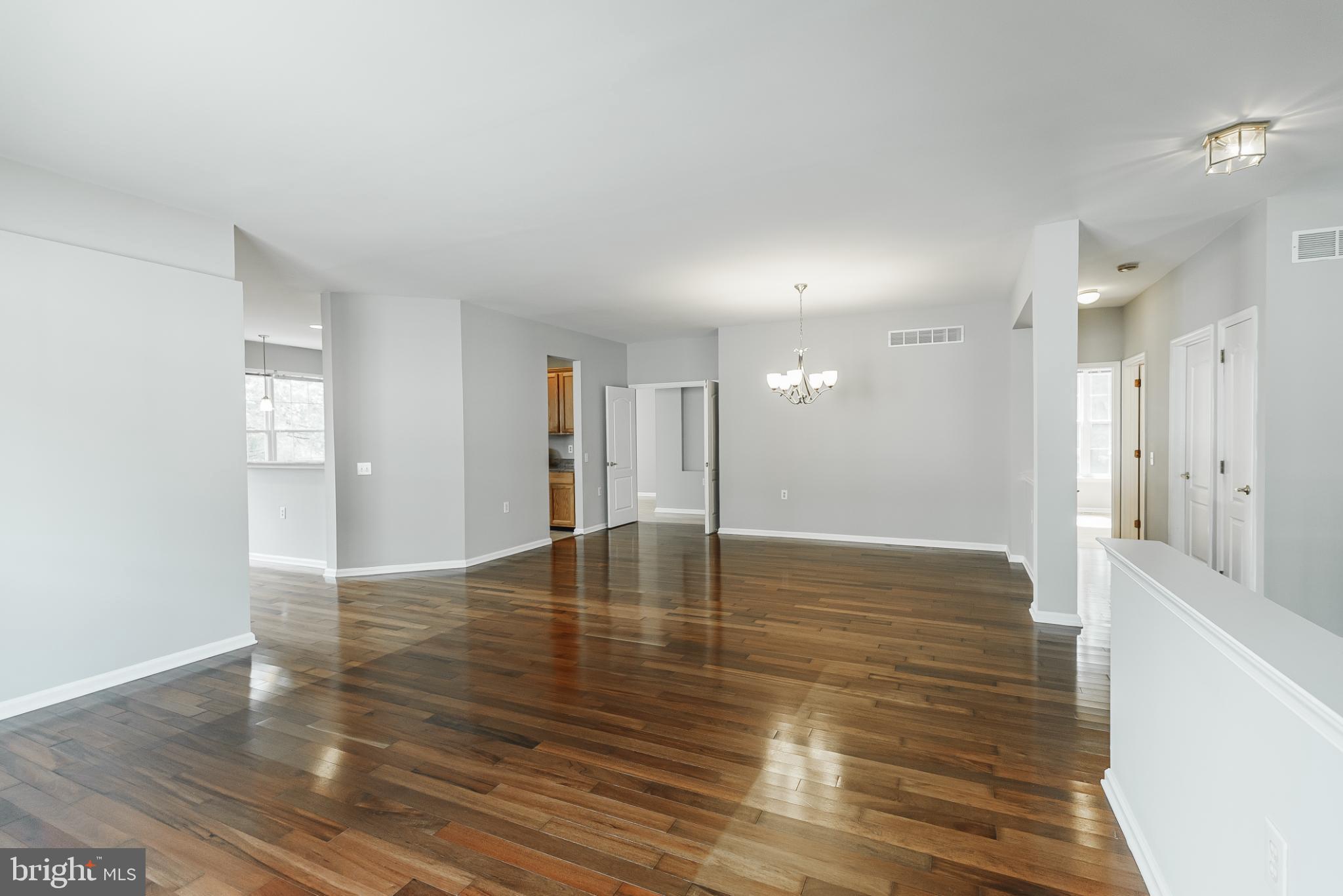 1484 Quaker Ridge West Chester, PA 19380 - Photo 6 of 50 Spacious, sunlit living area with elegance.