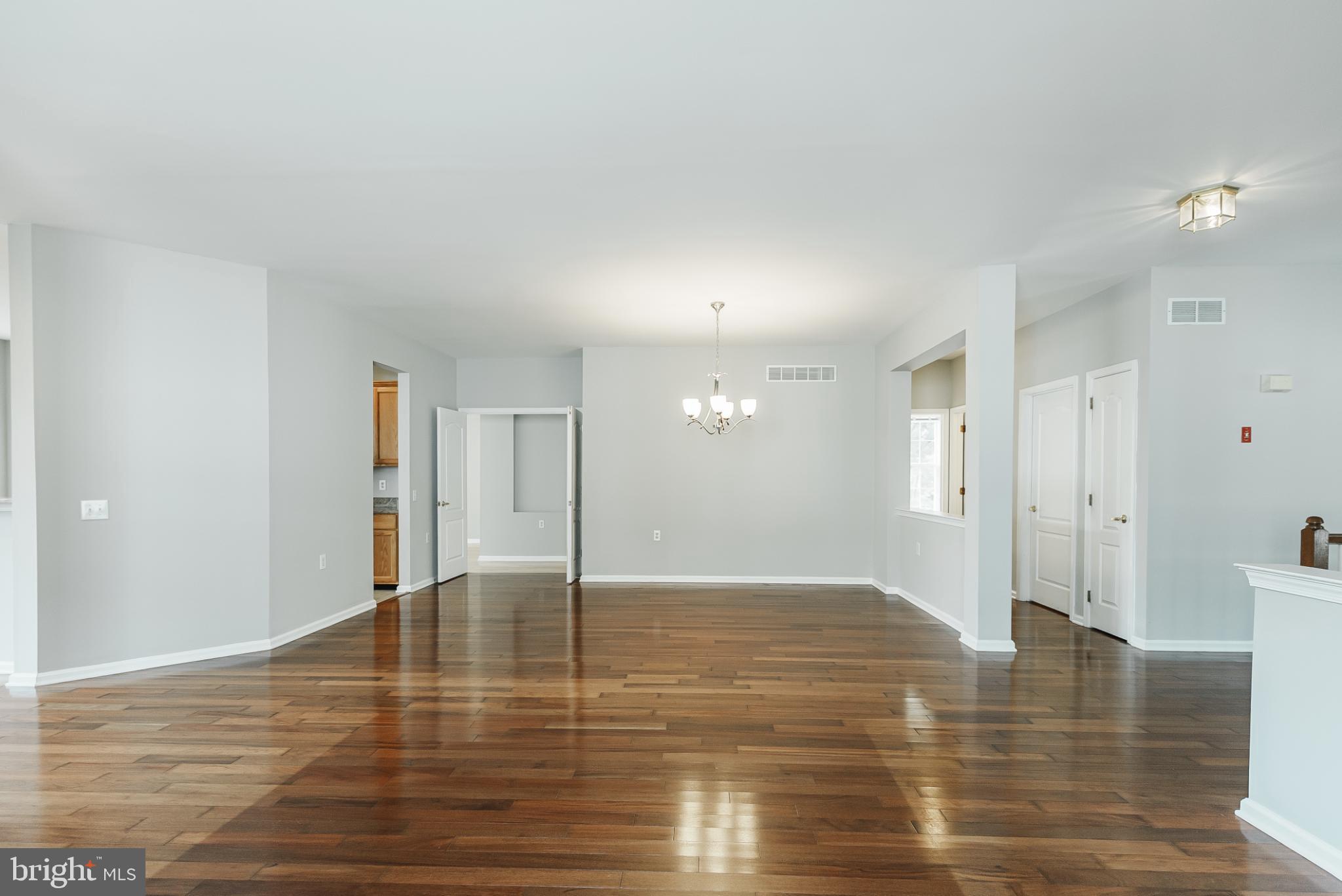 1484 Quaker Ridge West Chester, PA 19380 - Photo 7 of 50 Spacious, sunlit living area with elegance.